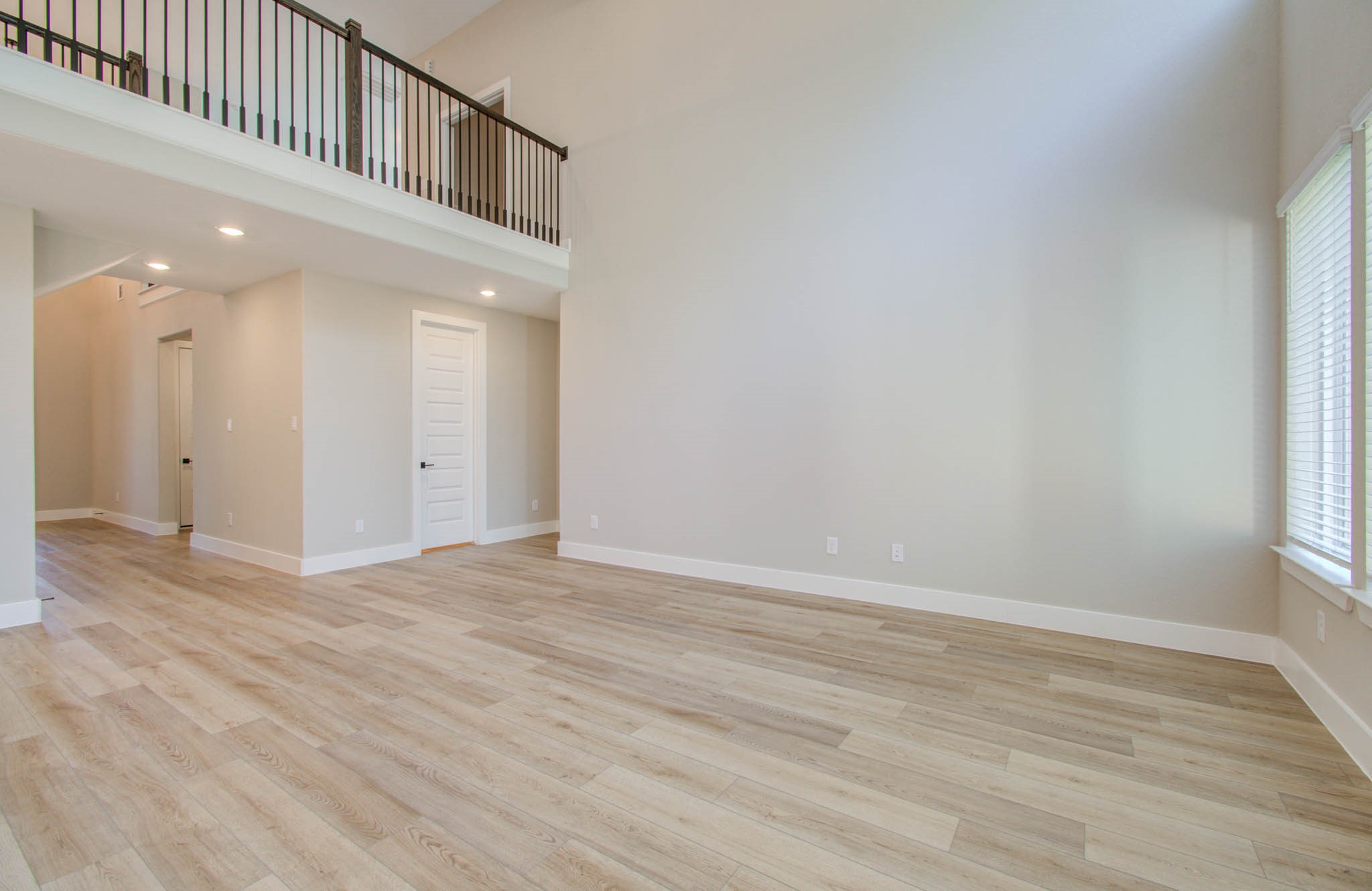 9950 Wild Indigo Circle Conroe, TX 77385 - Photo 13 of 50 a view of an entryway with wooden floor