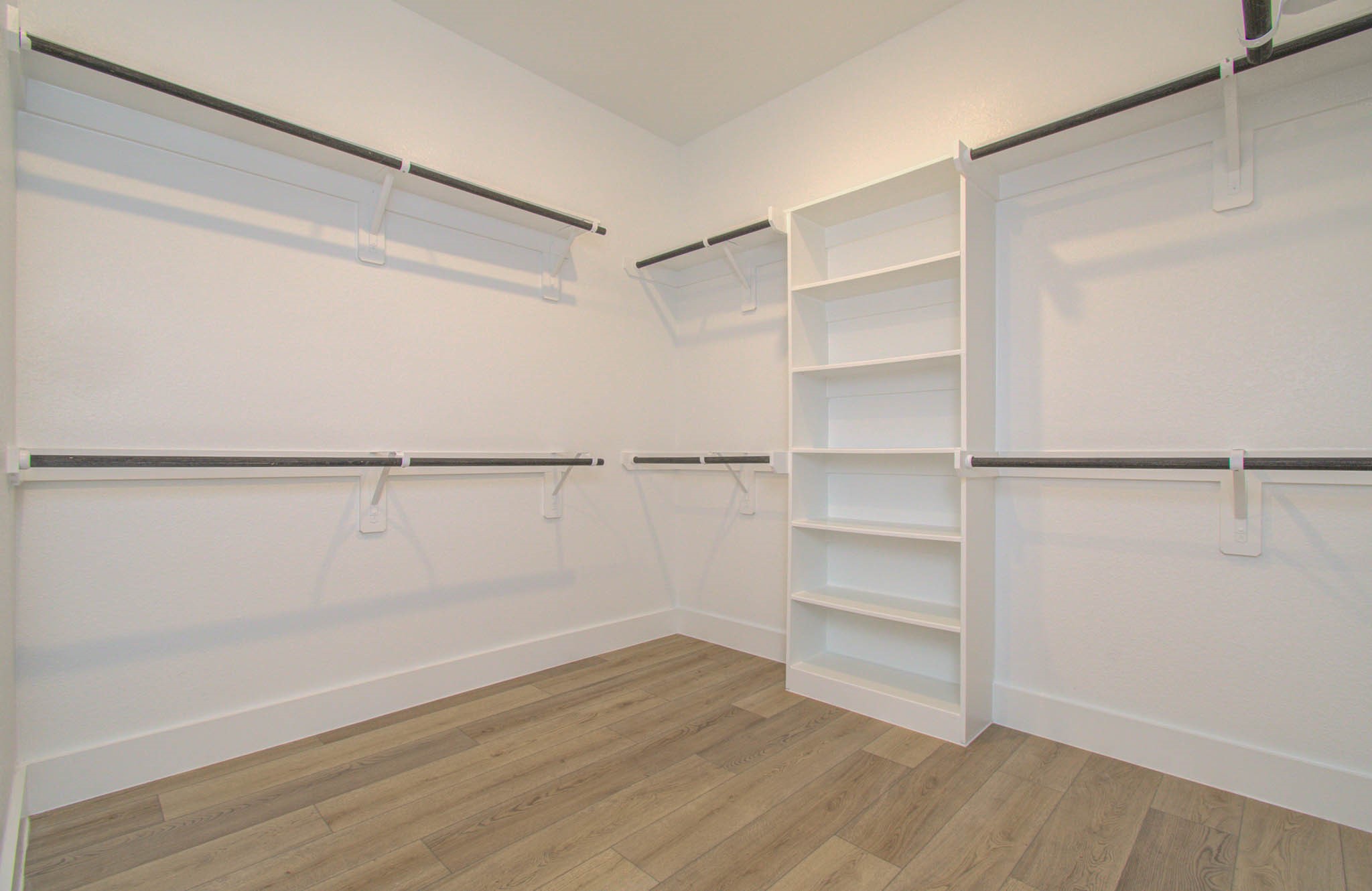 9950 Wild Indigo Circle Conroe, TX 77385 - Photo 25 of 50 a view of an empty walk in closet