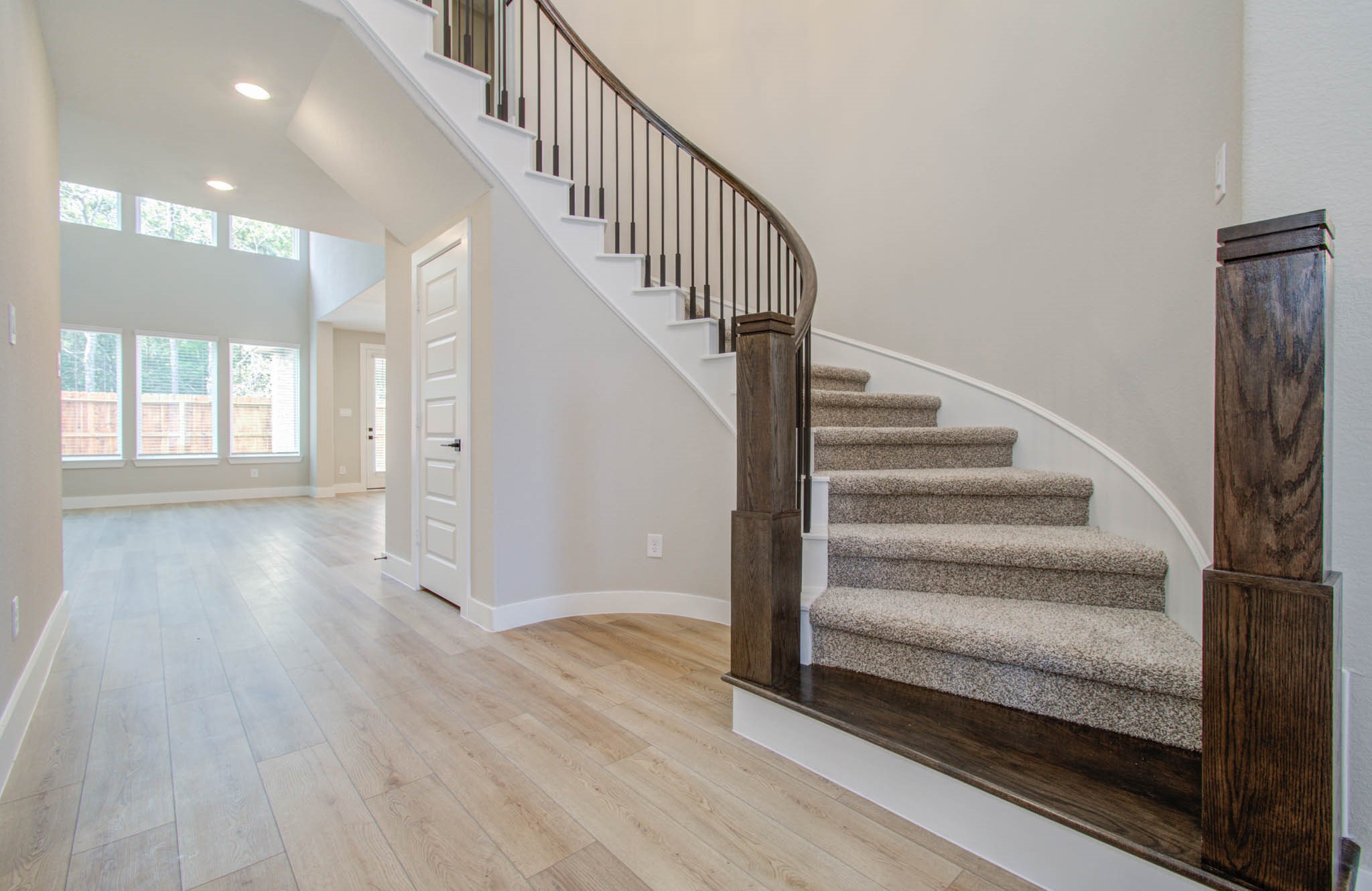 9950 Wild Indigo Circle Conroe, TX 77385 - Photo 26 of 50 a view of entryway and hall with wooden floor