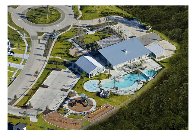9950 Wild Indigo Circle Conroe, TX 77385 - Photo 45 of 50 an aerial view of a house with a swimming pool