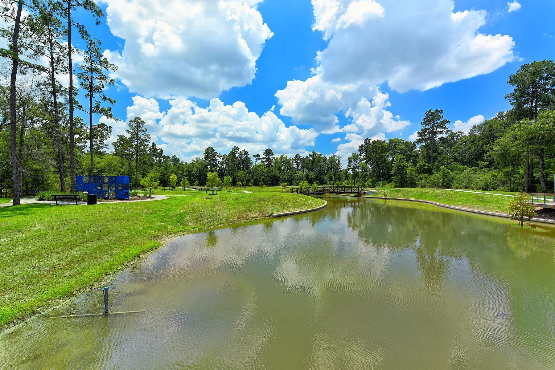 9950 Wild Indigo Circle Conroe, TX 77385 - Photo 47 of 50 a view of a lake with houses