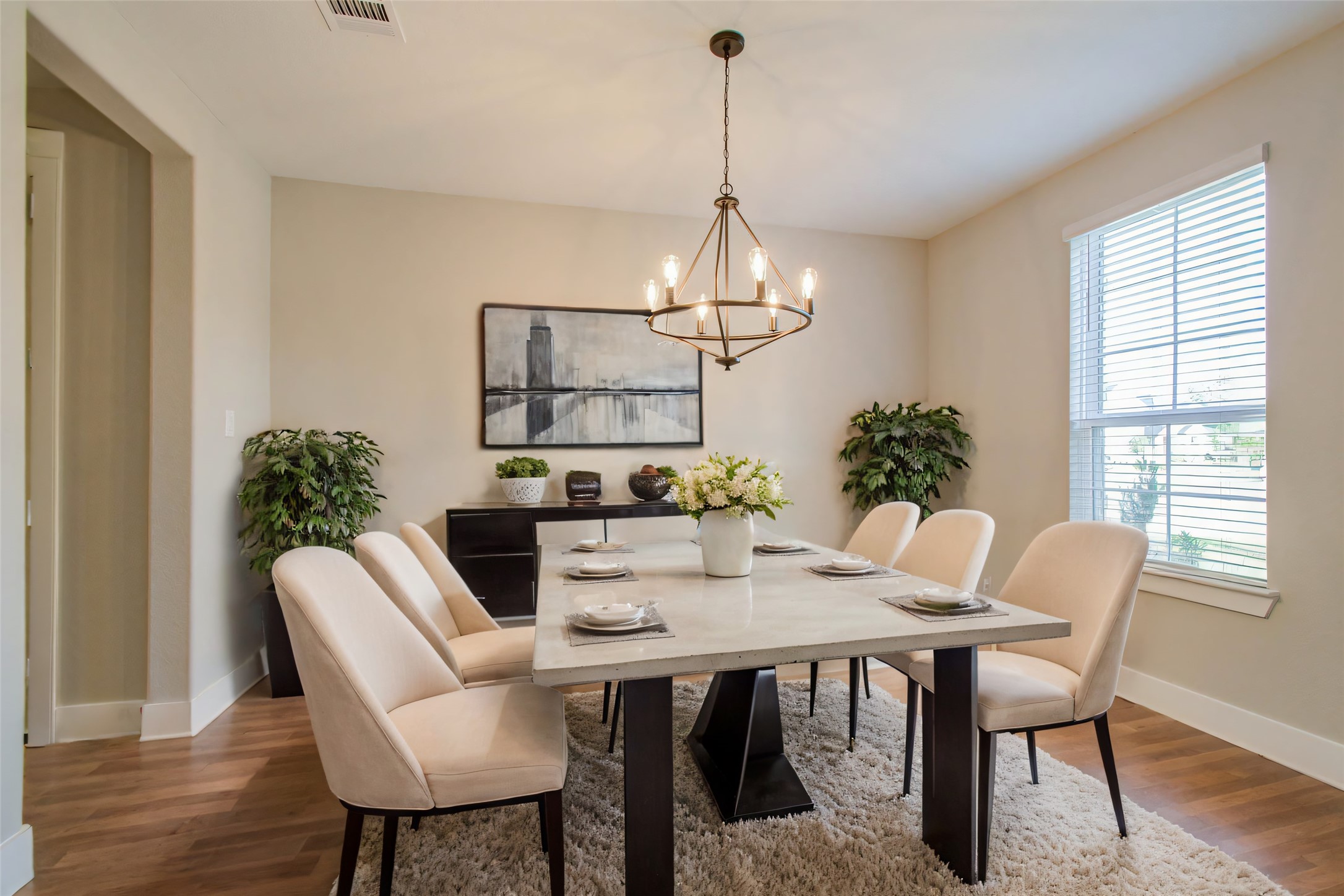 9950 Wild Indigo Circle Conroe, TX 77385 - Photo 6 of 50 a view of a dining room with furniture window and wooden floor