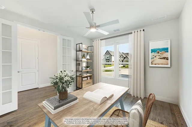 a workspace with furniture and window