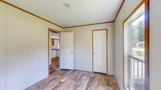 a view of entryway with wooden floor