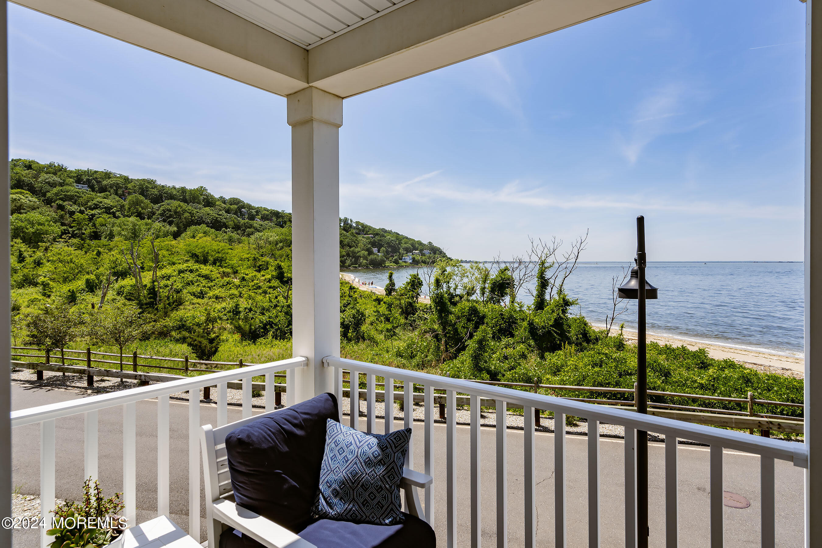 8 Lighthouse Point Road, Unit 703 Highlands, NJ 07732 - Photo 15 of 43 a view of a balcony with furniture