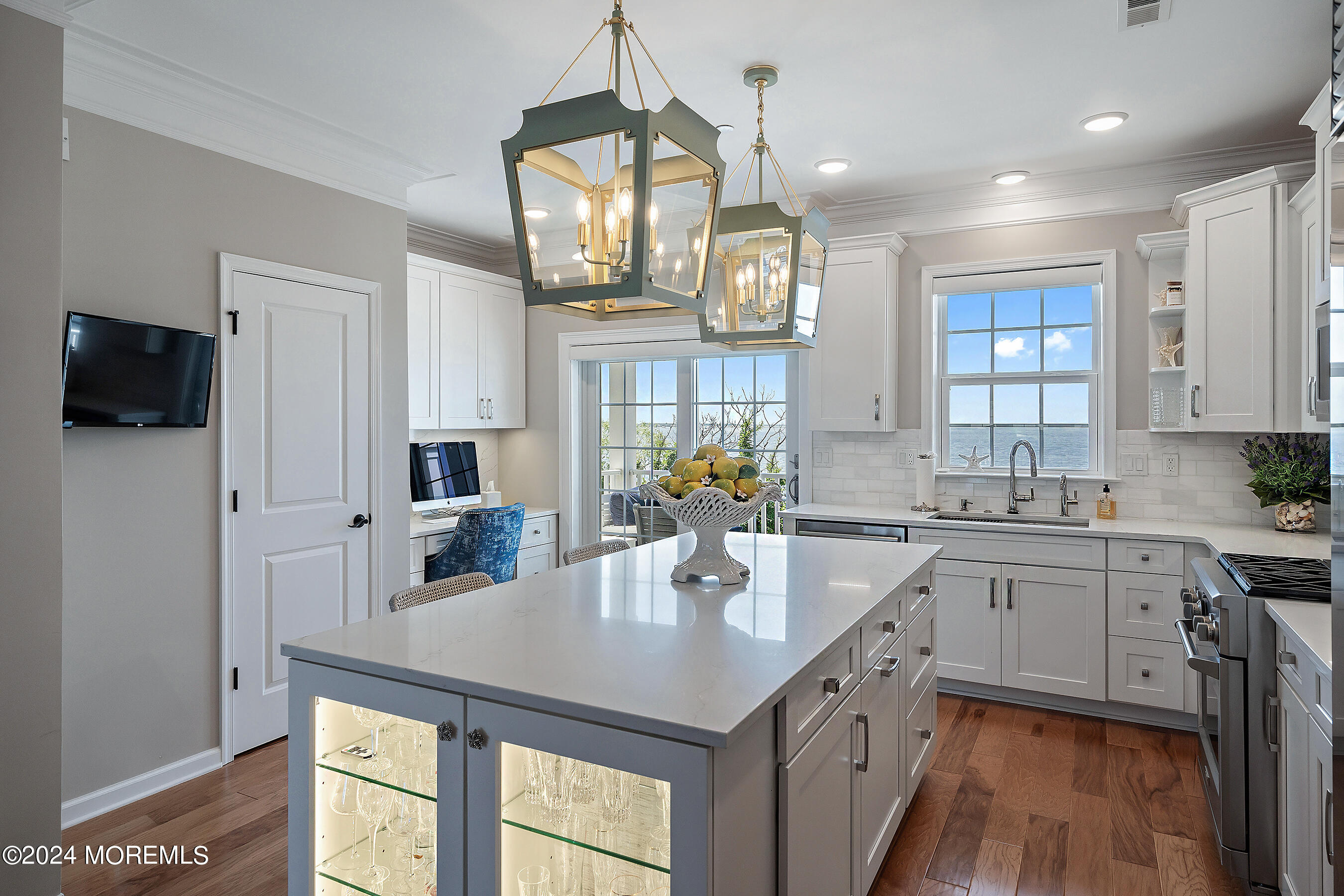 8 Lighthouse Point Road, Unit 703 Highlands, NJ 07732 - Photo 9 of 43 a kitchen with sink refrigerator and microwave