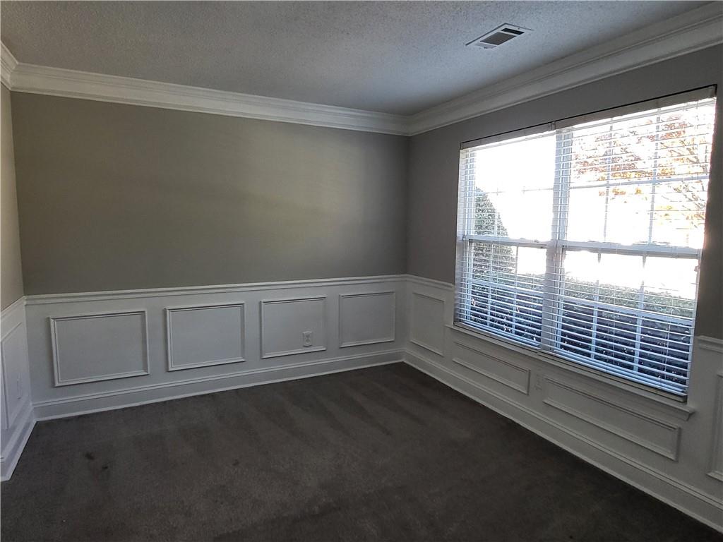 4234 Winston Circle Atlanta, GA 30349 - Photo 3 of 19 a view of an empty room with a window