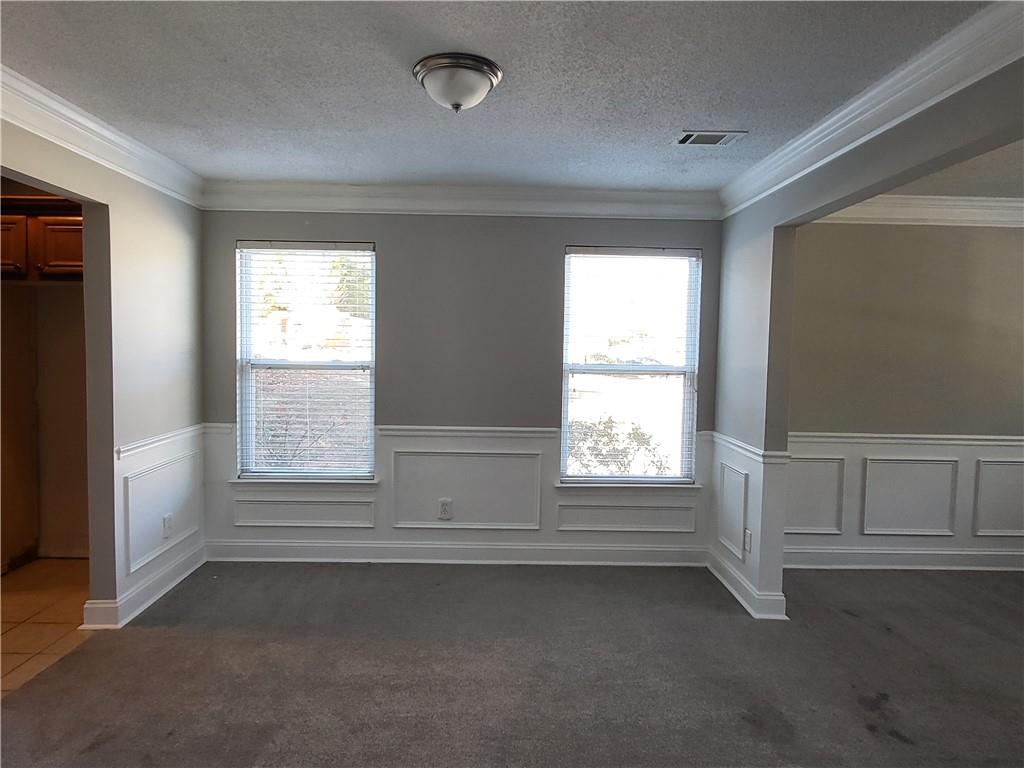 4234 Winston Circle Atlanta, GA 30349 - Photo 4 of 19 an empty room with a window