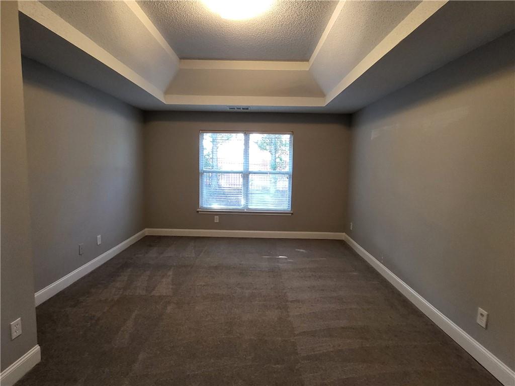 4234 Winston Circle Atlanta, GA 30349 - Photo 9 of 19 an empty room with a window