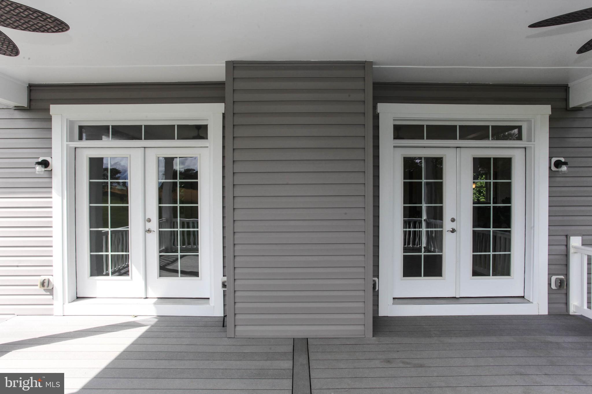 12787 Frederick Road West Friendship, MD 21794 - Photo 28 of 69 French doors leading to porch