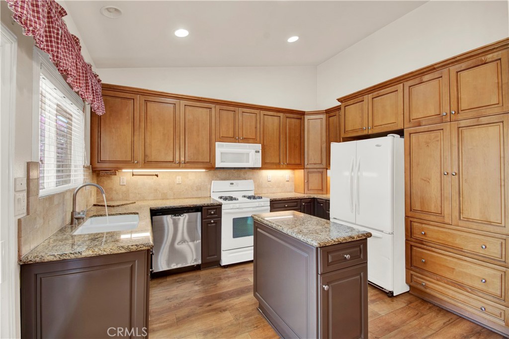768 Moonlight Court Banning, CA 92220 - Photo 21 of 70 Custom Kitchen Cabinets. Bottom Cabinets were just painted.