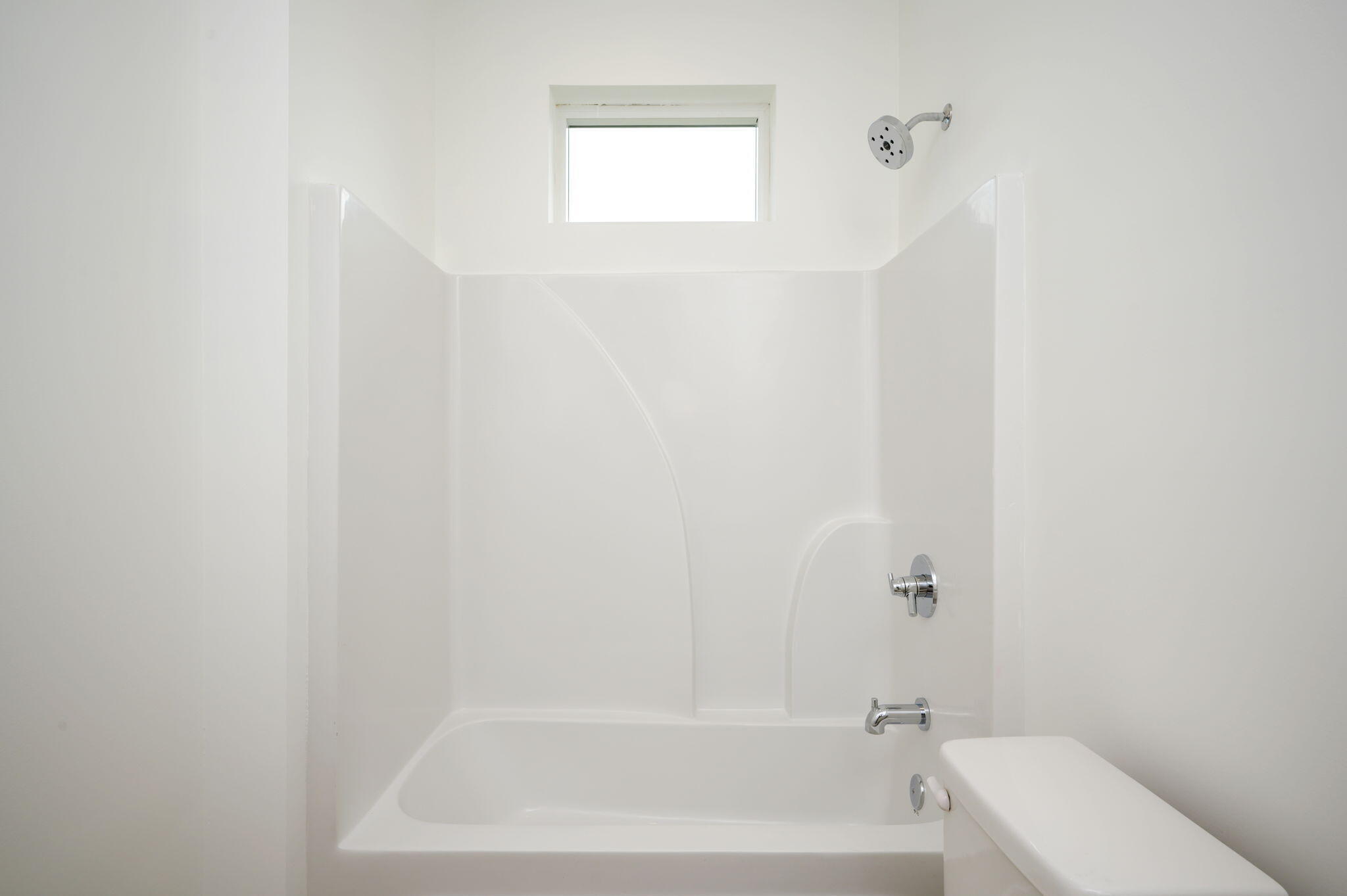 114 Enchanted Way Santa Rosa Beach, FL 32459 - Photo 20 of 33 a bathroom with a bathtub and window