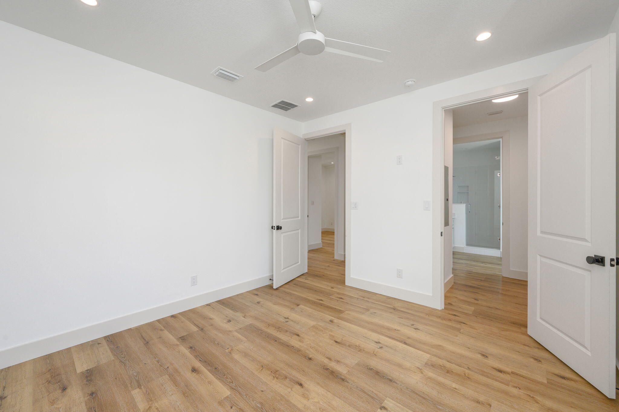 114 Enchanted Way Santa Rosa Beach, FL 32459 - Photo 22 of 33 wooden floor in an empty room