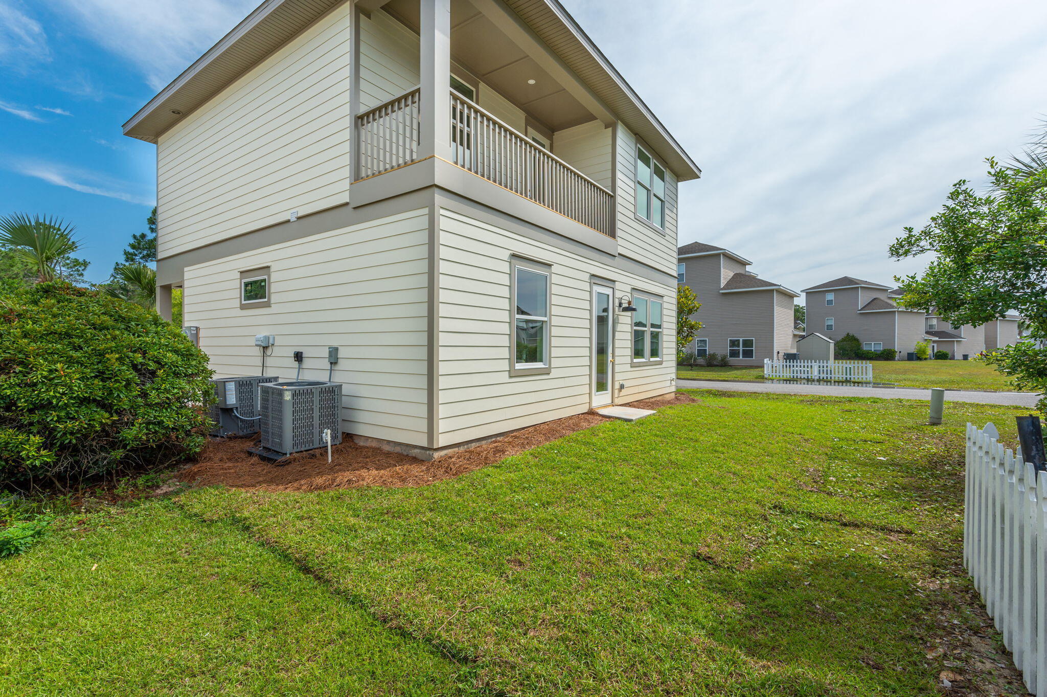 114 Enchanted Way Santa Rosa Beach, FL 32459 - Photo 30 of 33 a view of a house with a yard and sitting area