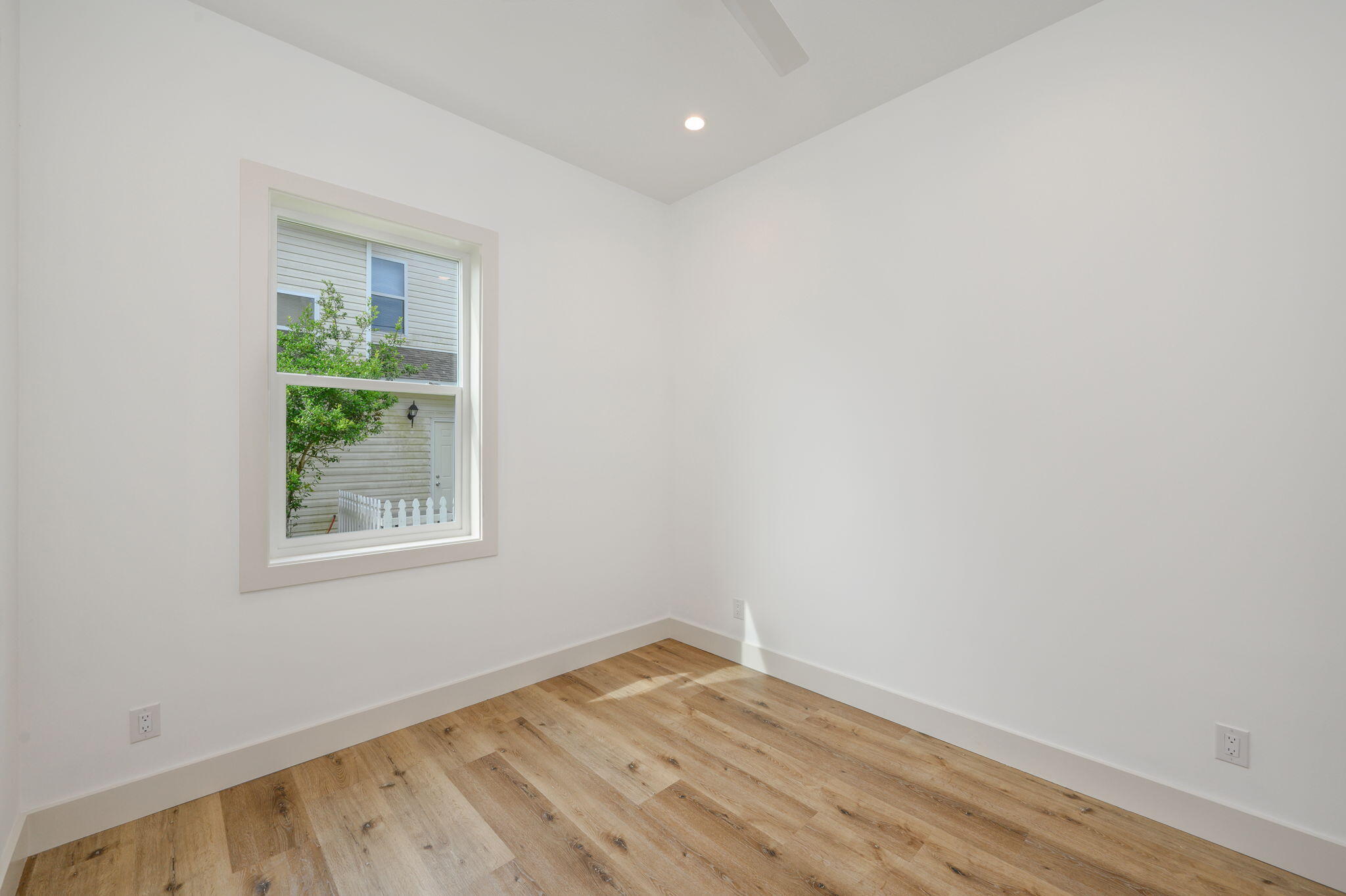 114 Enchanted Way Santa Rosa Beach, FL 32459 - Photo 6 of 33 an empty room with a window