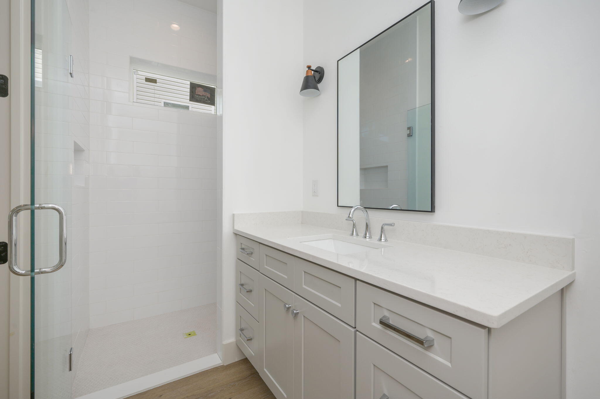 114 Enchanted Way Santa Rosa Beach, FL 32459 - Photo 10 of 33 a bathroom with a sink and a mirror