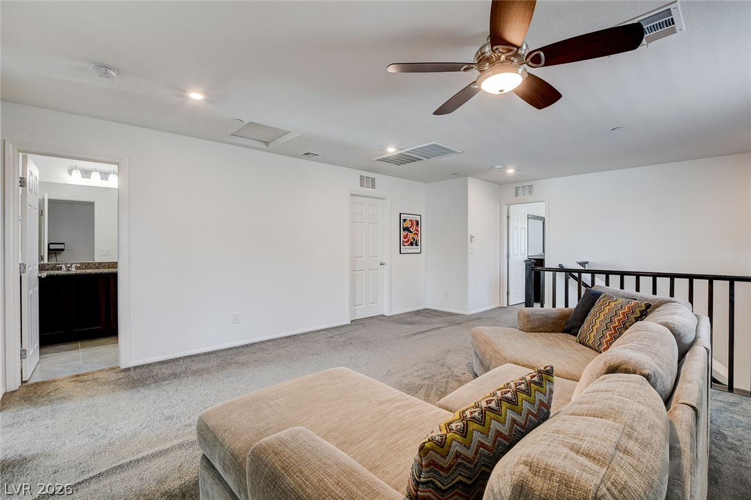484 Filaree Place Henderson, NV 89015 - Photo 28 of 71 This versatile loft area offers comfortable living with convenient access to a full bathroom.