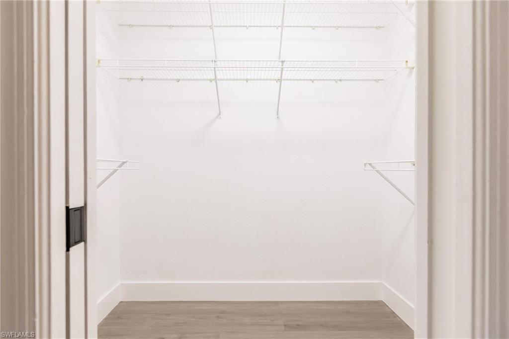 18289 Hepatica Road Fort Myers, FL 33967 - Photo 23 of 45 a view of small space with racks on the wall