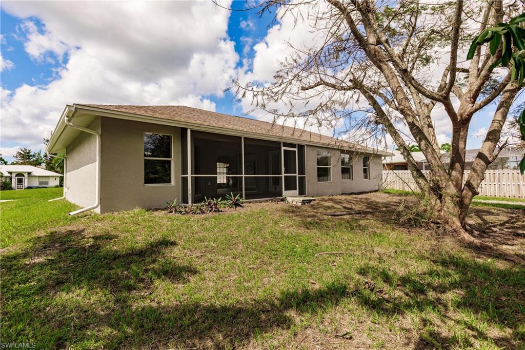 18289 Hepatica Road Fort Myers, FL 33967 - Photo 43 of 45 a view of a house with a yard