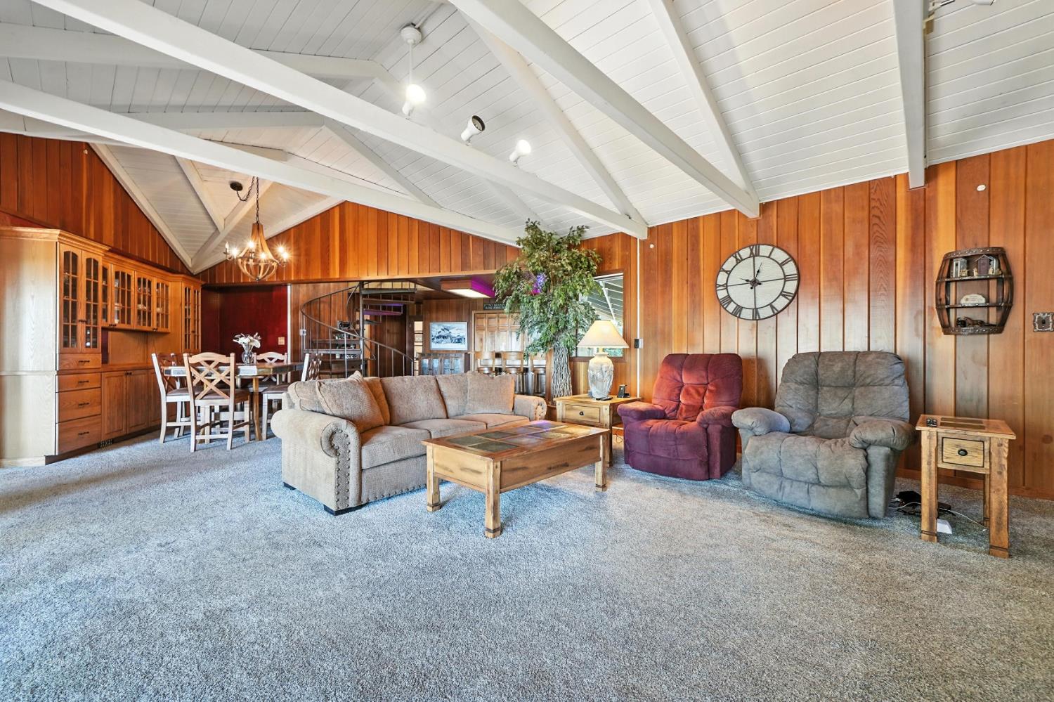 19630 Charleston Road Volcano, CA 95689 - Photo 13 of 70 a living room with patio furniture and a large window