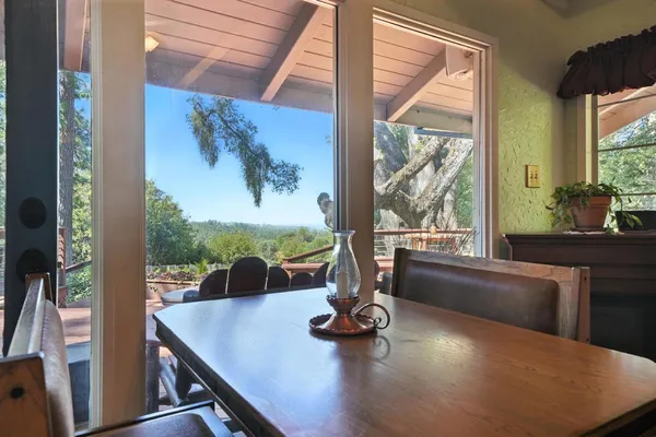 a bed room with a bed window and a flat screen tv