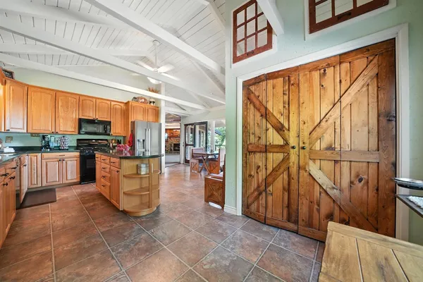 a dining room with furniture and a table