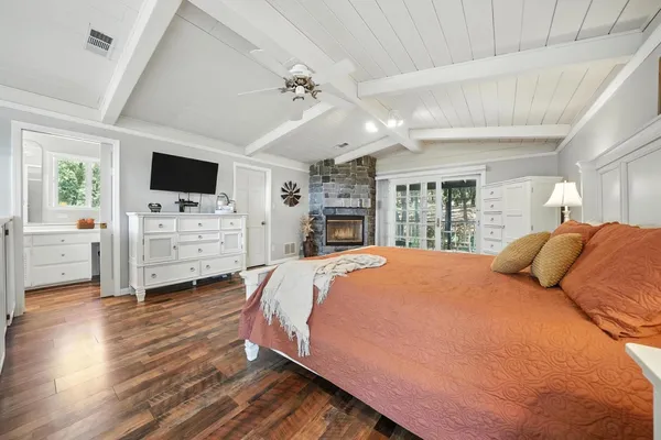 a view of balcony with furniture and wooden deck