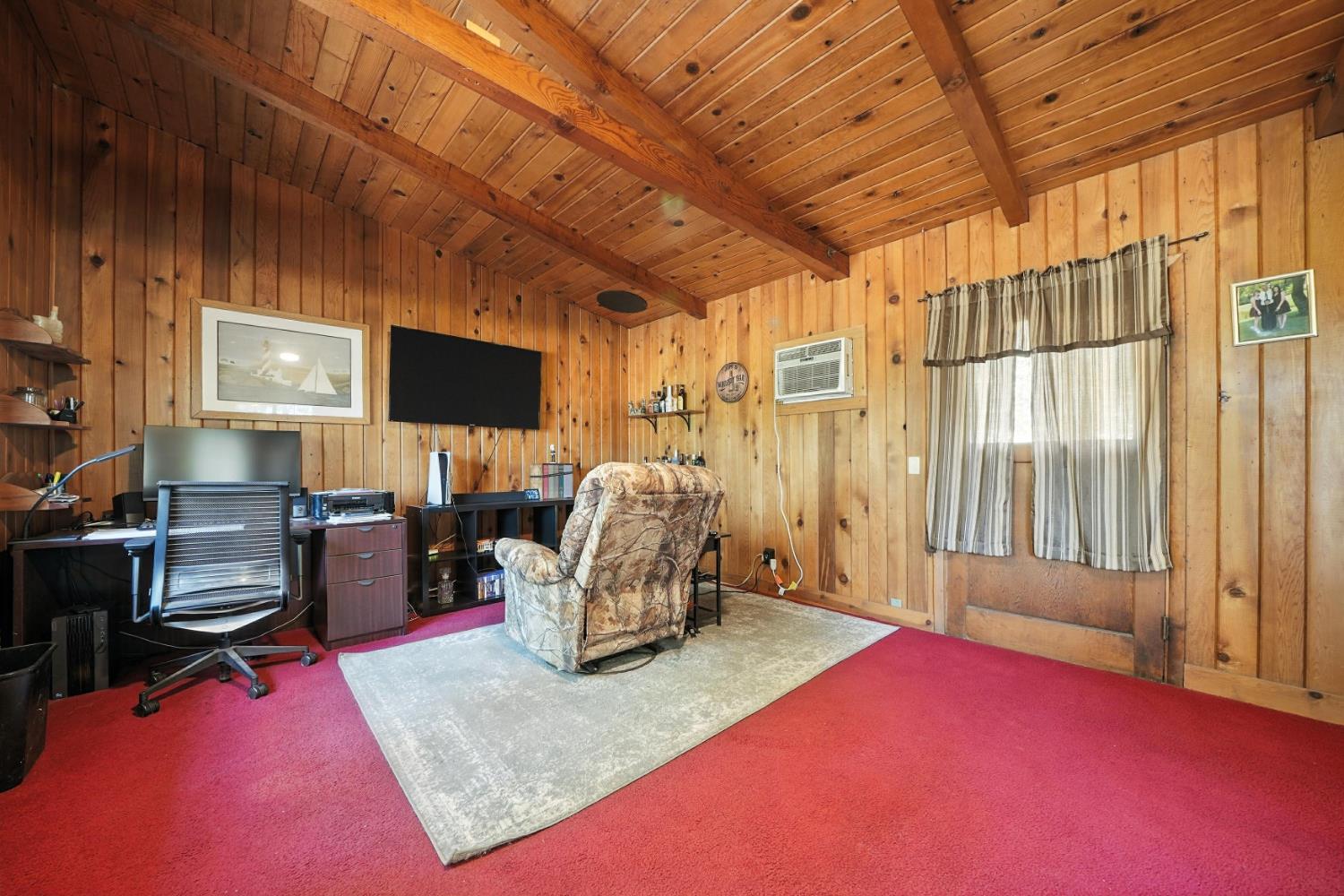 19630 Charleston Road Volcano, CA 95689 - Photo 49 of 70 a view of a livingroom with workspace and a window