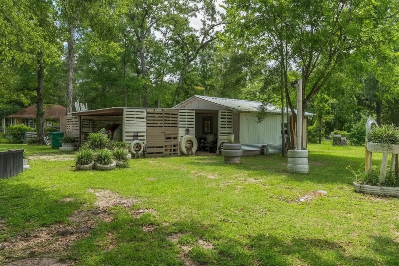 2118 Rolling Hills Road Conroe, TX 77303 - Photo 33 of 39 Spacious homesite offers room to roam, play, garden, or simply enjoy the outdoors.