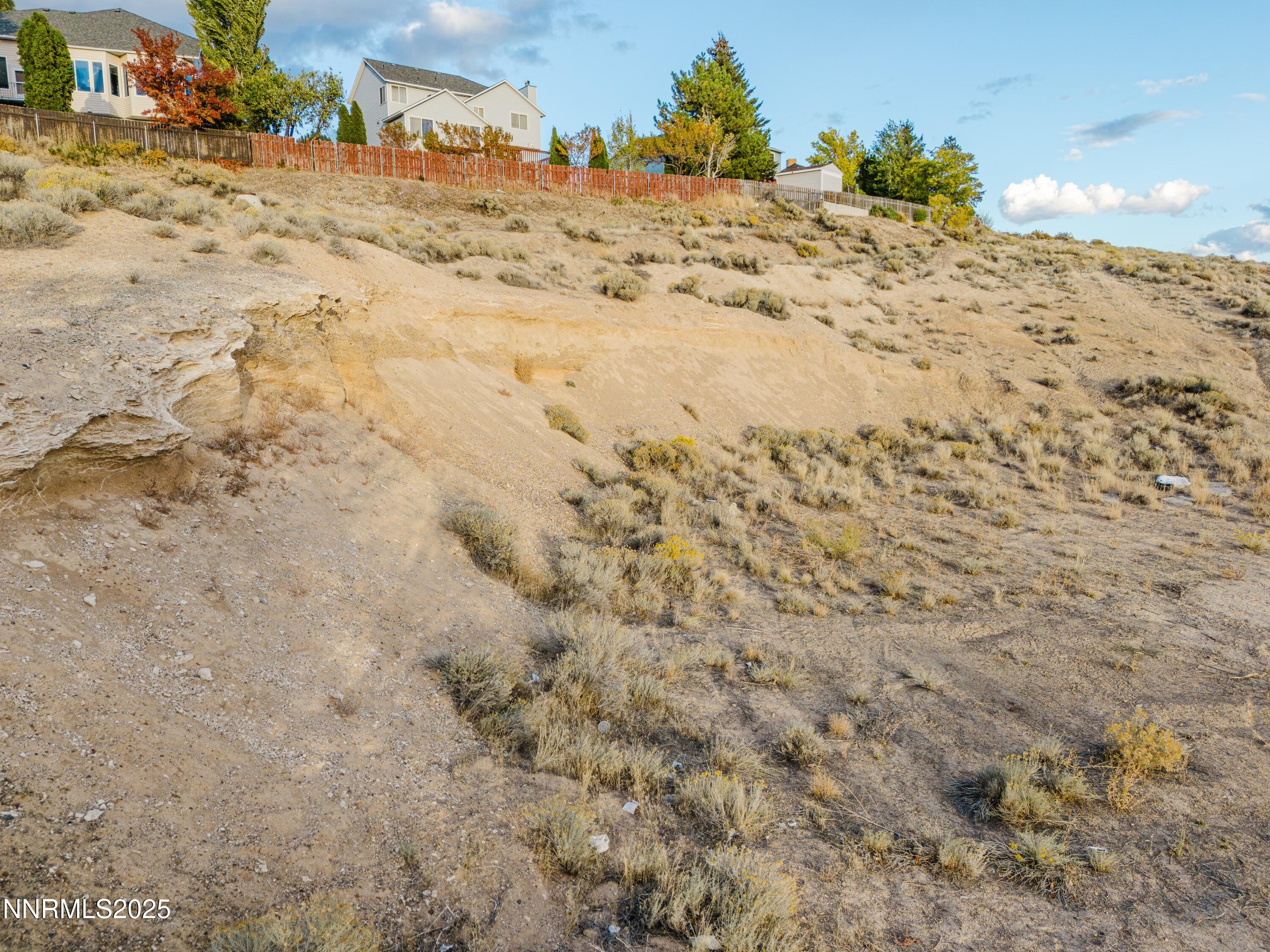 Tbd Spruce Road Elko, NV 89801 - Photo 5 of 26 a view of a dry yard with wooden fence