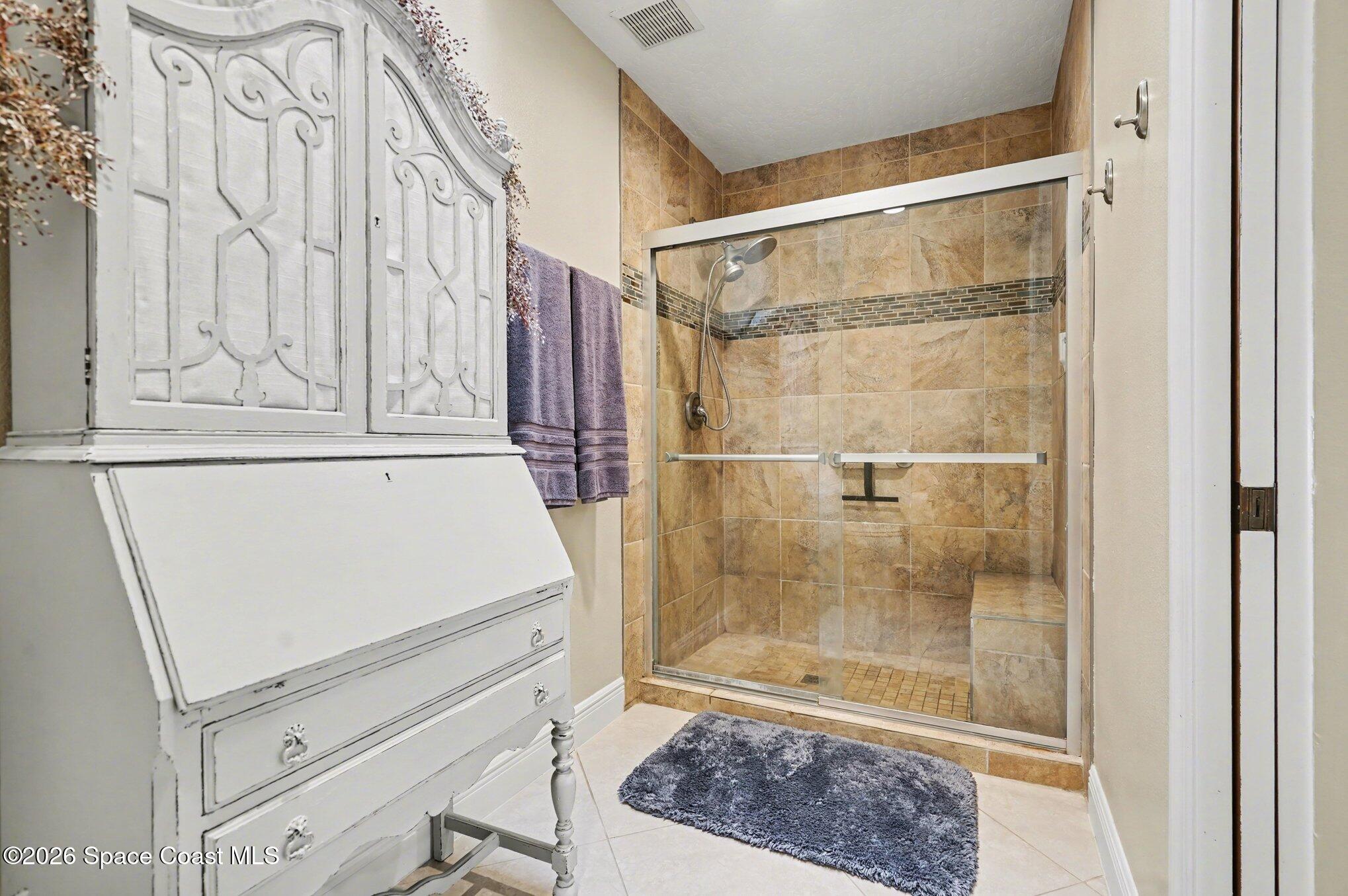 873 Ridge Lake Drive Melbourne, FL 32940 - Photo 17 of 27 a bathroom with a shower