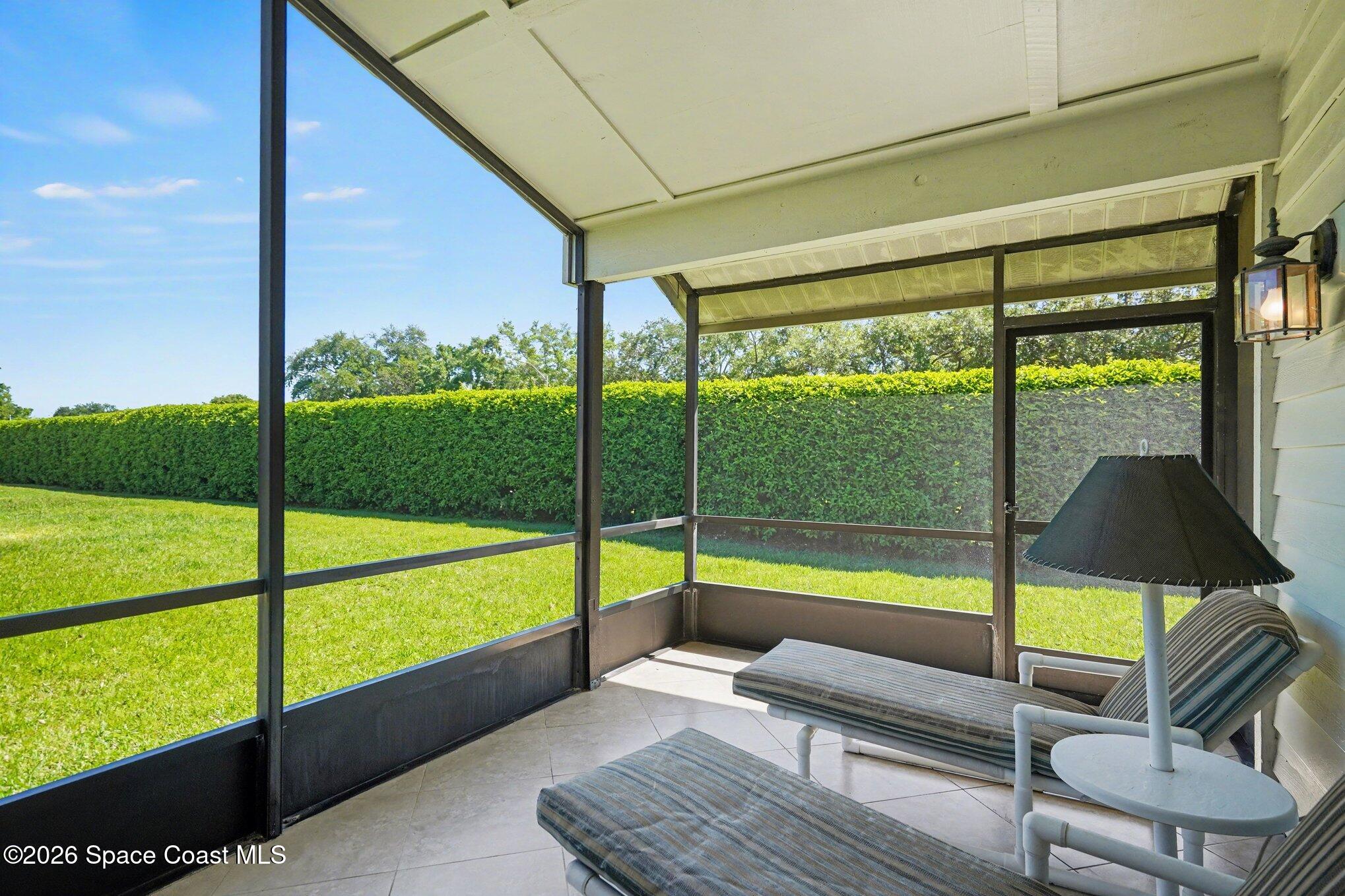 873 Ridge Lake Drive Melbourne, FL 32940 - Photo 25 of 27 a view of swimming pool with seating area and roof
