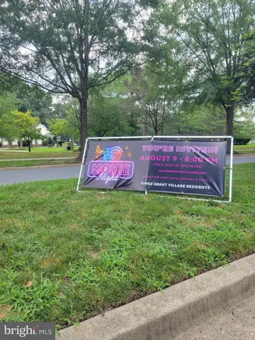 a view of swimming pool with a yard
