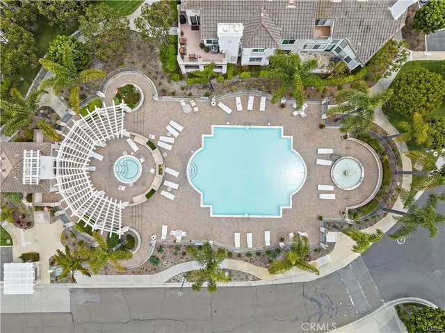 an aerial view of a house with a garden and plants