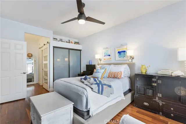 a large white bed in a white room