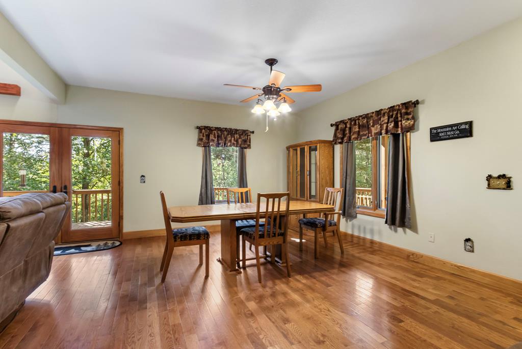 297 Lovingood Road Marble, NC 28905 - Photo 11 of 91 a dining room with furniture window wooden floor