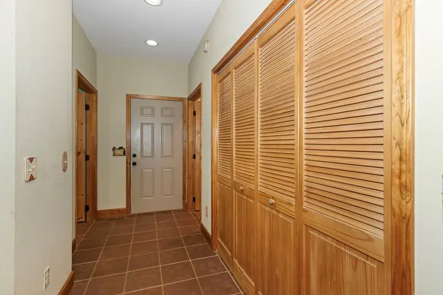 a bathroom with a sink vanity and a mirror