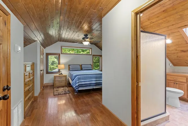 a bathroom with a sink vanity and a mirror