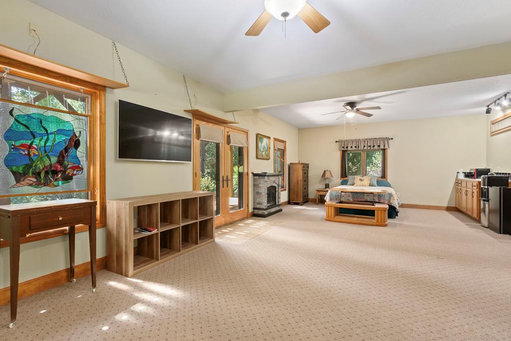 297 Lovingood Road Marble, NC 28905 - Photo 45 of 91 a view of a livingroom with furniture and a flat screen tv