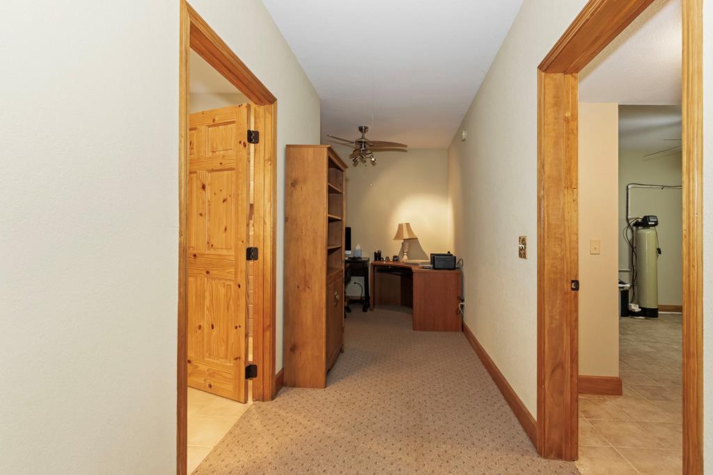 297 Lovingood Road Marble, NC 28905 - Photo 51 of 91 a view of a hallway with a livingroom and a bathroom