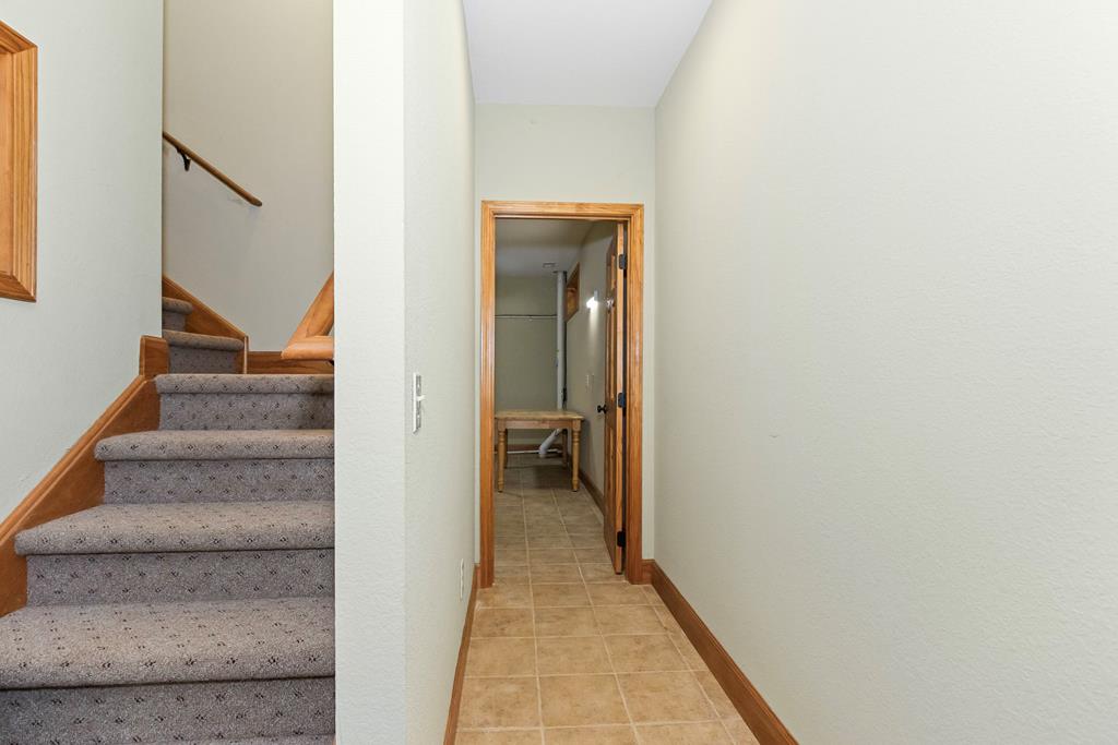 297 Lovingood Road Marble, NC 28905 - Photo 60 of 91 a view of a hallway with wooden floor and entryway