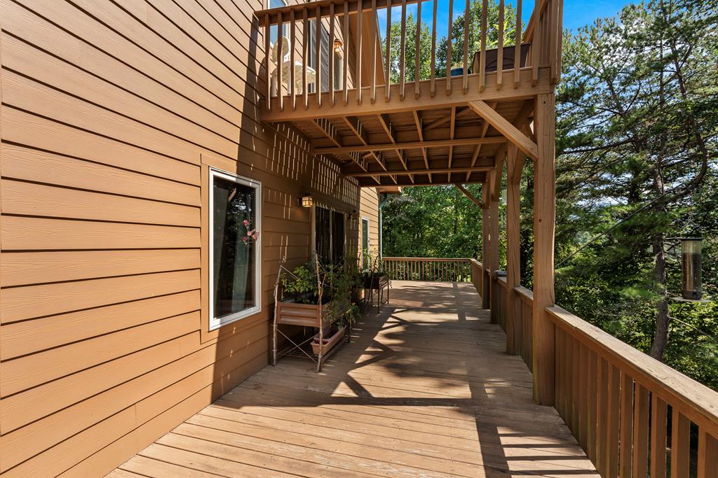 297 Lovingood Road Marble, NC 28905 - Photo 66 of 91 a view of a patio with wooden floor