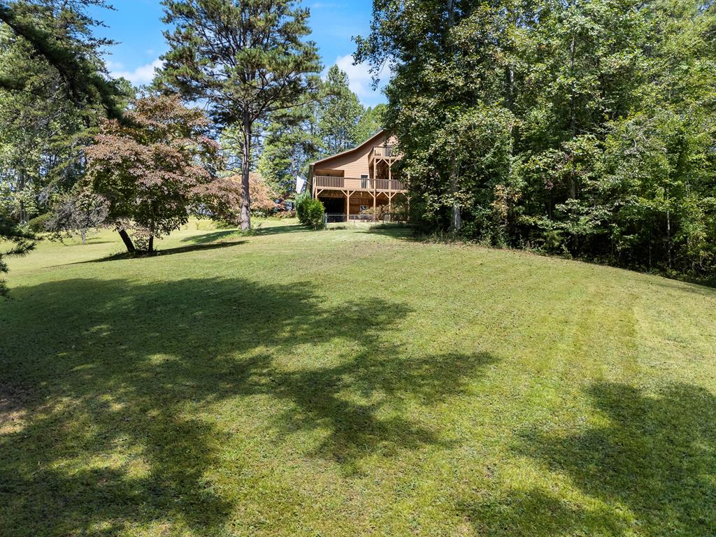 297 Lovingood Road Marble, NC 28905 - Photo 86 of 91 a house view with a garden space
