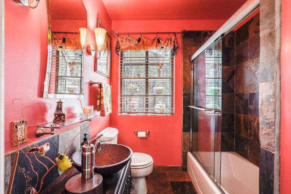 1893 Anthony Court Mountain View, CA 94040 - Photo 11 of 38 a bathroom with a granite countertop sink toilet and shower