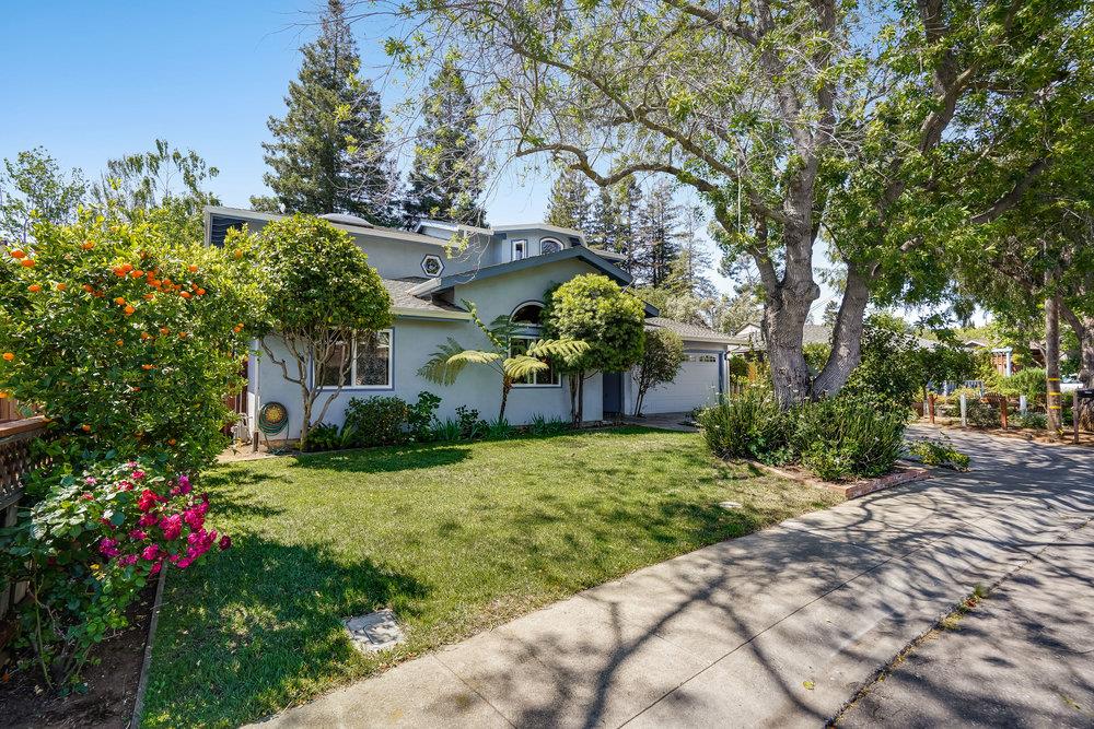 1893 Anthony Court Mountain View, CA 94040 - Photo 2 of 38 a front view of a house with a yard