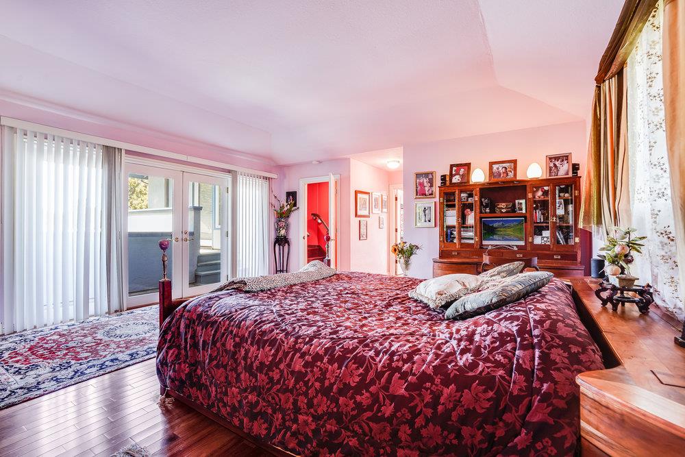 1893 Anthony Court Mountain View, CA 94040 - Photo 22 of 38 a bed sitting in a bedroom next to a window