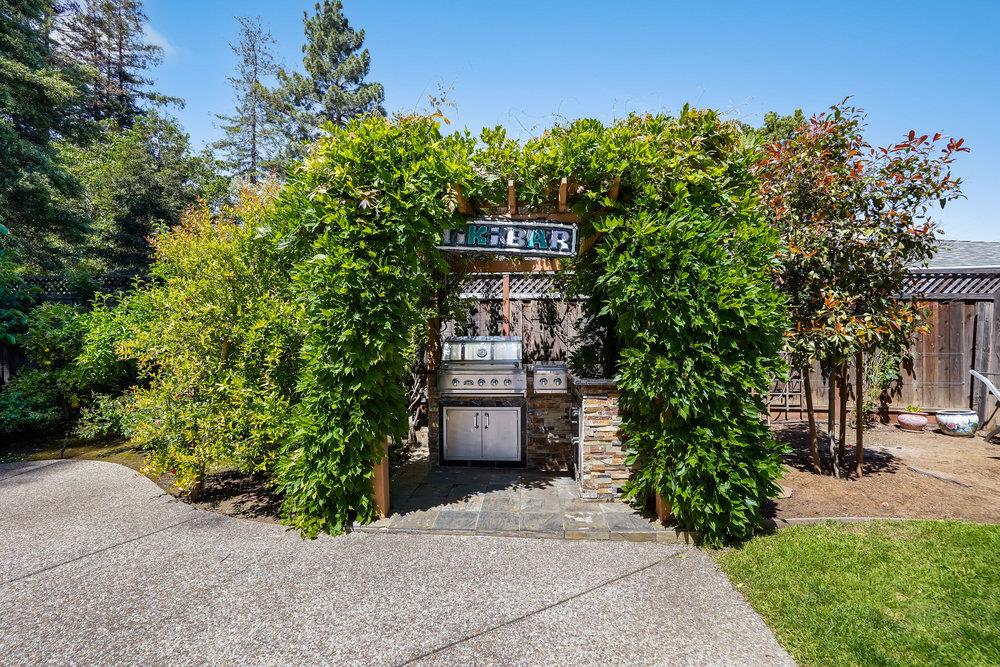 1893 Anthony Court Mountain View, CA 94040 - Photo 30 of 38 a front view of a house with a yard and tree s