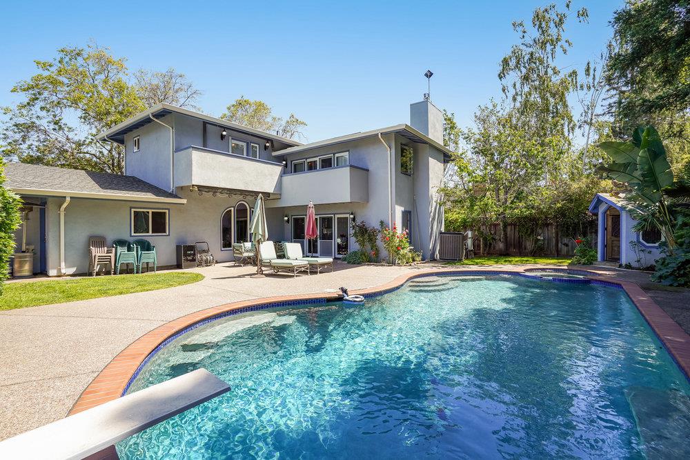 1893 Anthony Court Mountain View, CA 94040 - Photo 31 of 38 a view of a house with swimming pool and a yard