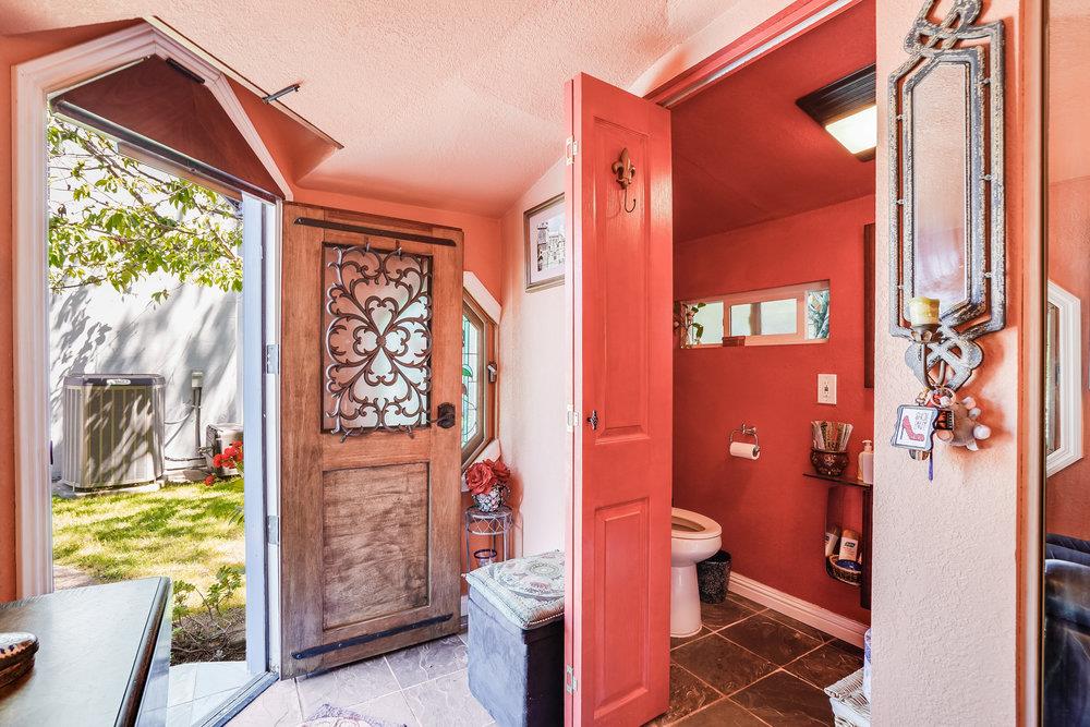 1893 Anthony Court Mountain View, CA 94040 - Photo 36 of 38 a bathroom with a toilet sink and a shower curtain