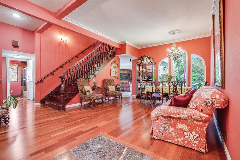 1893 Anthony Court Mountain View, CA 94040 - Photo 7 of 38 a living room with furniture a large window and wooden floor